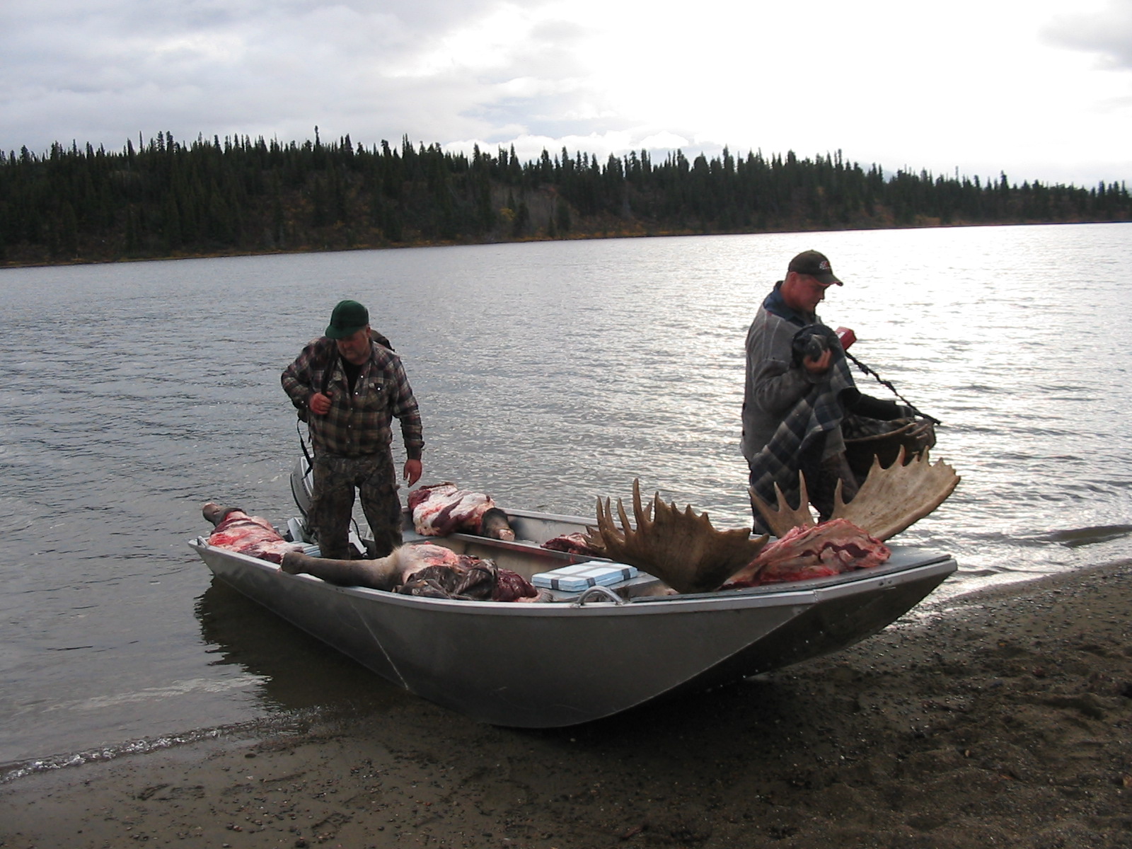 Packing back to camp by boat